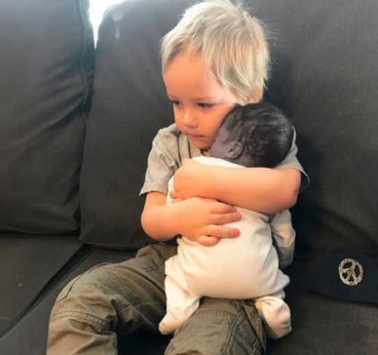 The stillborn baby was placed in his old