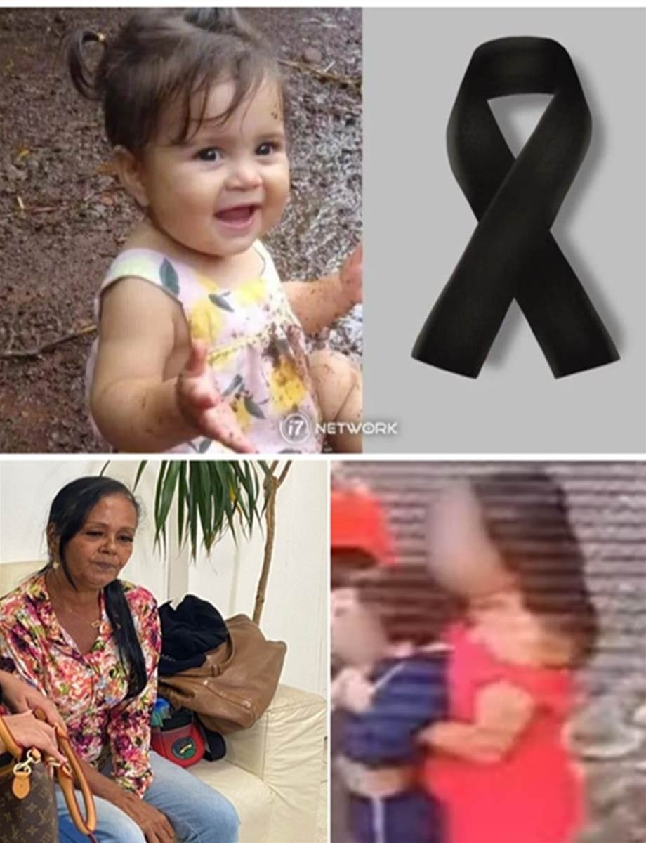 Young woman puts both babies inside the fir…