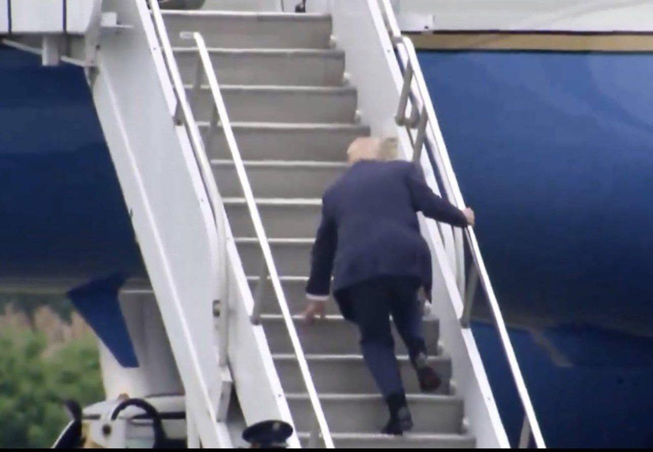Donald Trump falls on the stairs while boarding Air Force One…