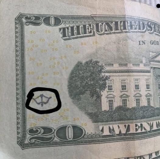 The Real Reason Your $20 Bill Has a Bow-and-Arrow Symbol