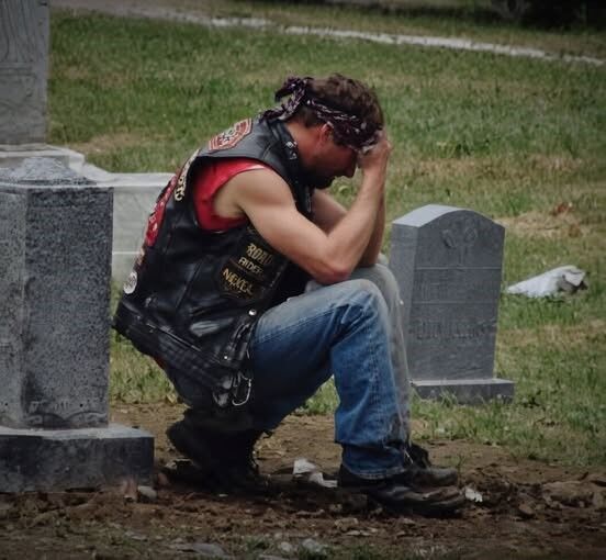 A mysterious biker visited my late wife’s grave every Saturday at exactly 2 PM, sitting silently by her headstone for an hour before disappearing again. For months I watched, confused and angry, until the truth behind his quiet devotion shattered everything I thought I knew about her life.